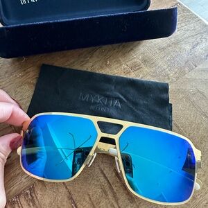 Mykita Gold Sunglasses with Blue Lenses
